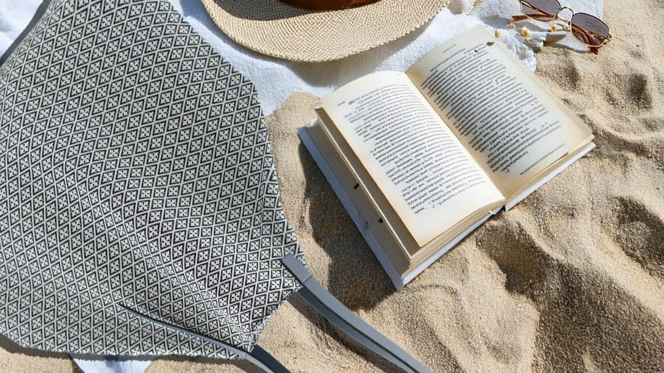 MARK / GIUSTI Italian canvas beach bag with signature mosaic pattern styled on sand