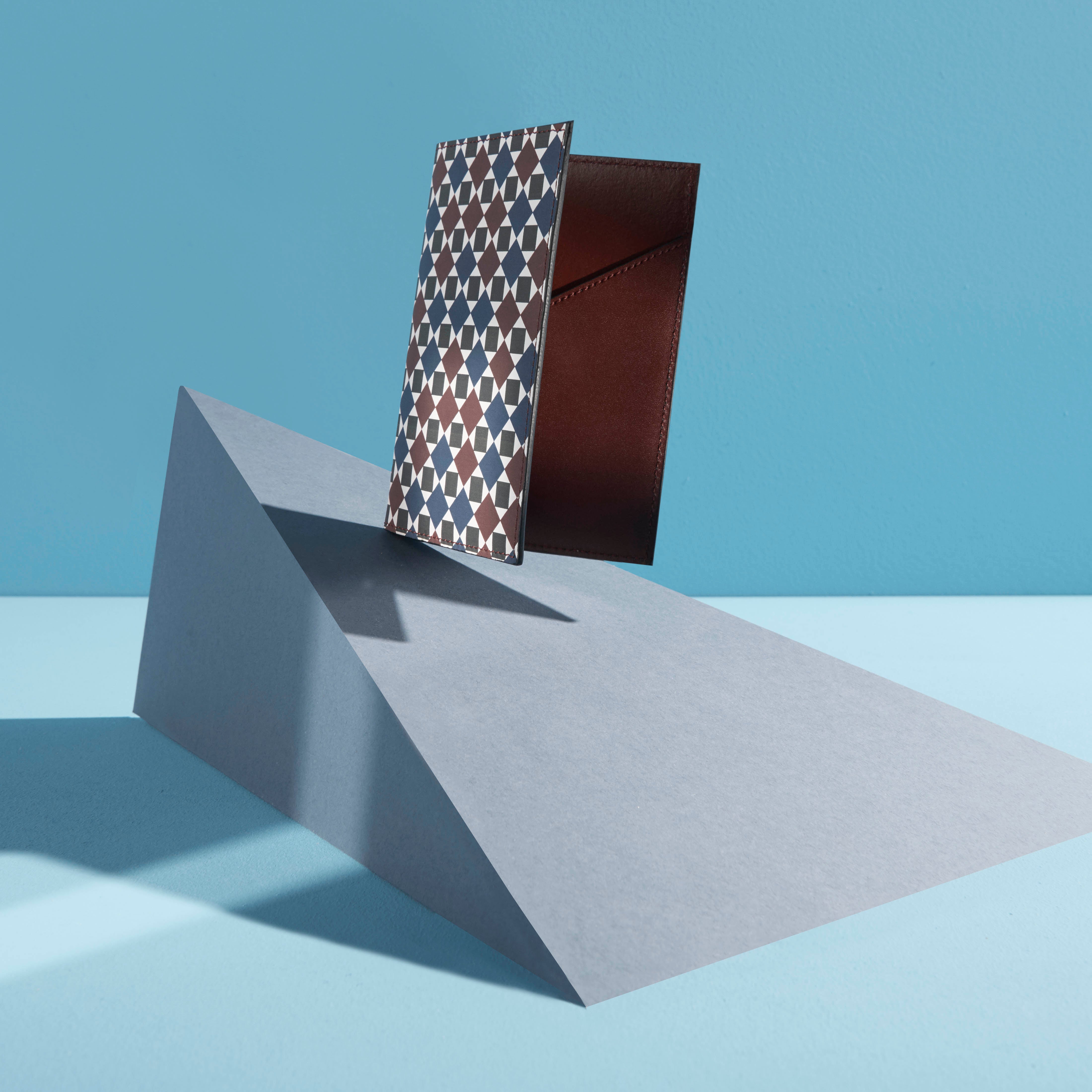 Final artistic masterpiece of the Heathrow passport cover from the London Calling collection, showcasing MARK/GIUSTI’s interpretation of mosaic heritage in a functional, luxury travel accessory.