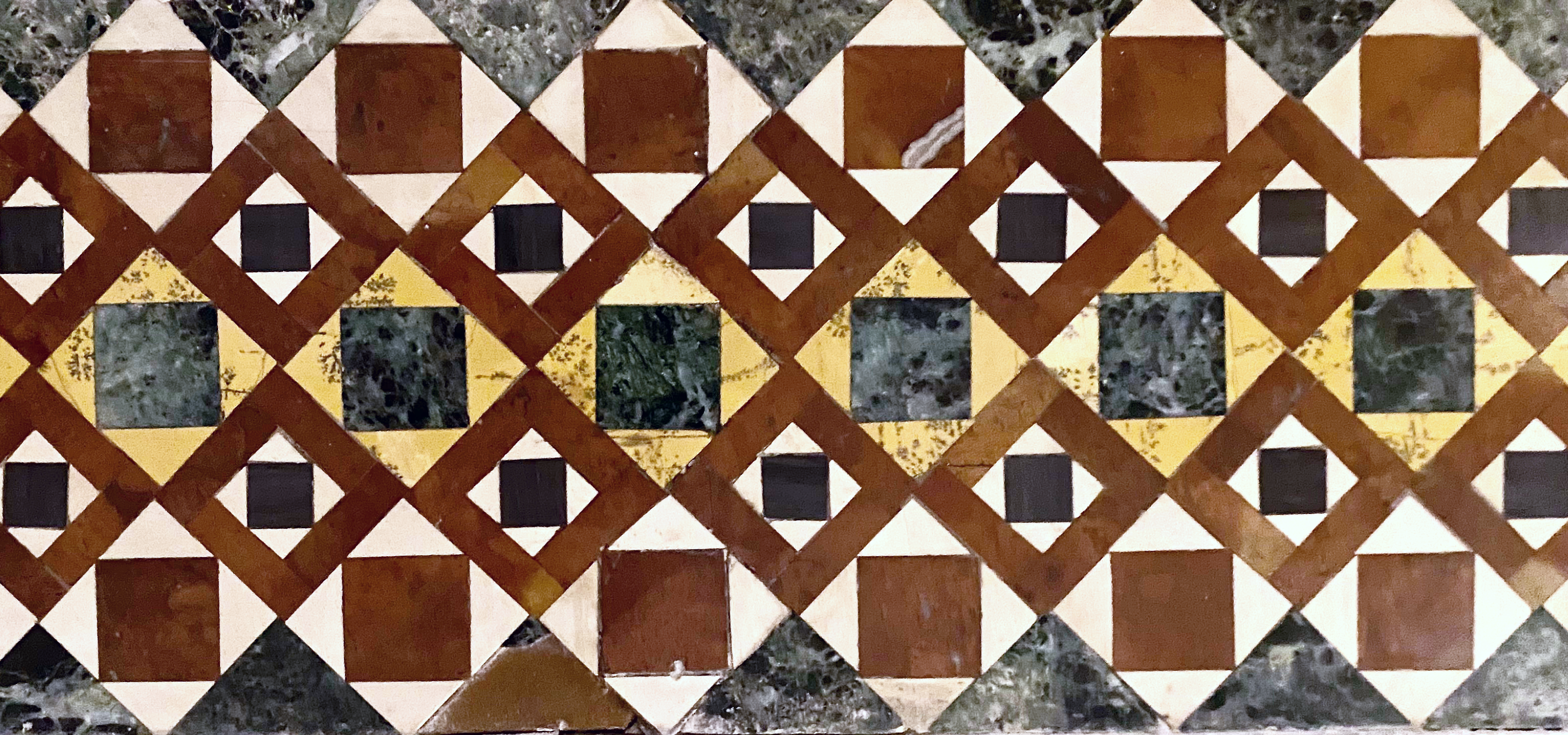 Cosmati mosaic at Palazzo dei Normani in Palermo, a key inspiration behind MARK / GIUSTI's luxury designs.