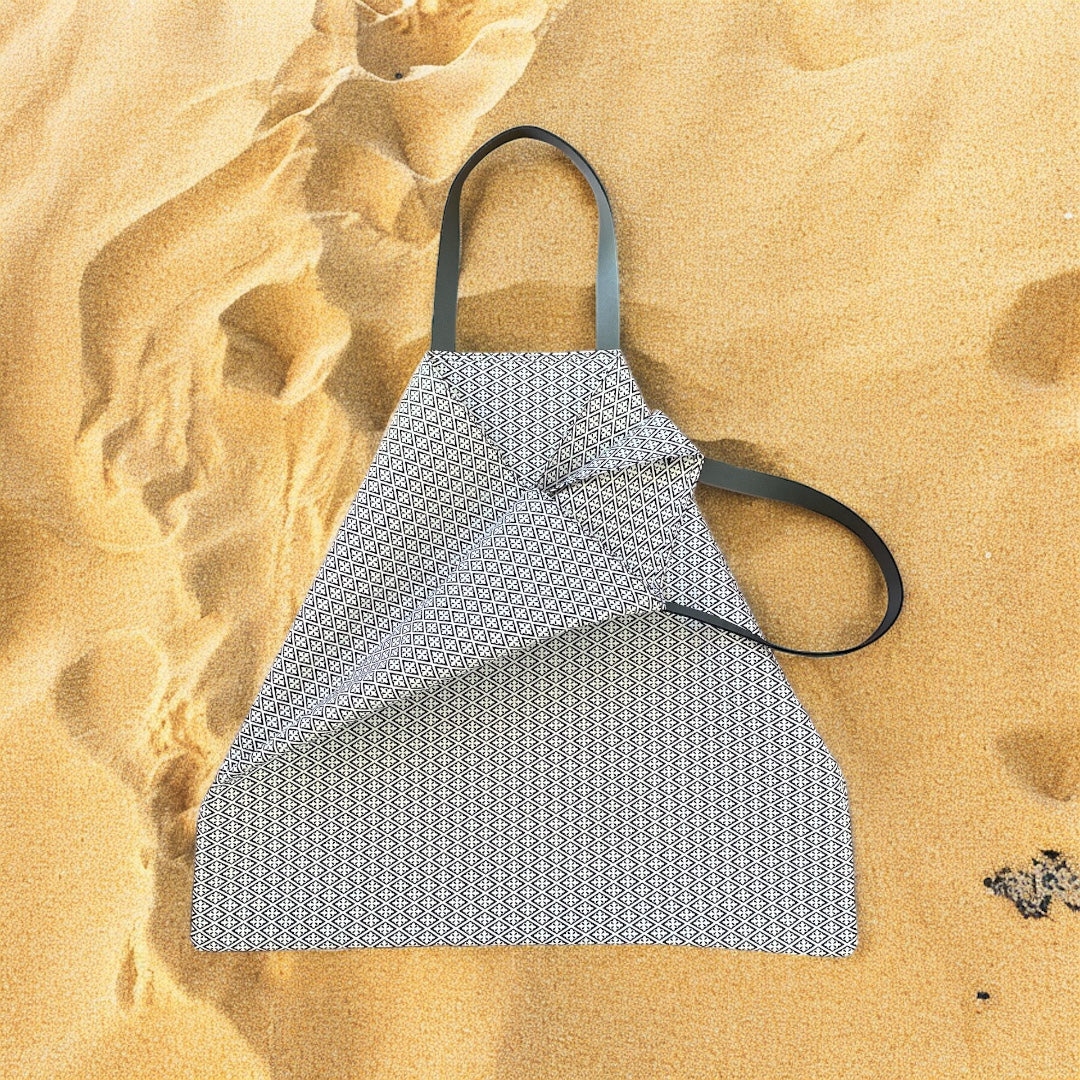 Large Maiori Beach Bag in La Dolce Vita Signature Mosaic from the Amalfi Dreams Collection, displayed on a sandy beach. Showcasing vibrant Italian craftsmanship and elegant design.