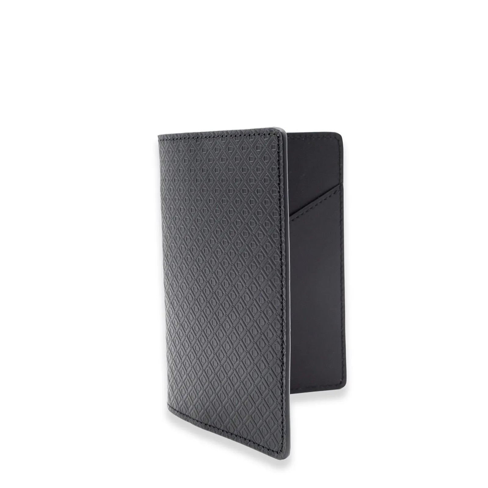 MARK / GIUSTI Heathrow passport wallet in Embossed Jet Black vegetable-tanned leather.